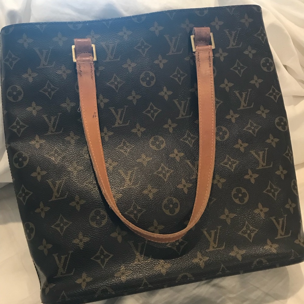 Louis Vuitton bucket purse.